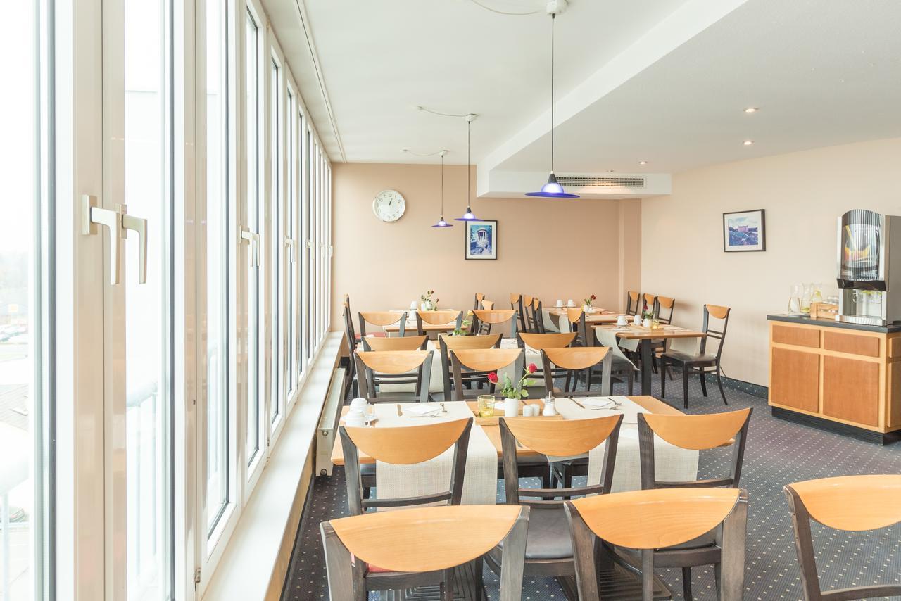 Arcadia Hotel Heidelberg Шветцинген Екстер'єр фото